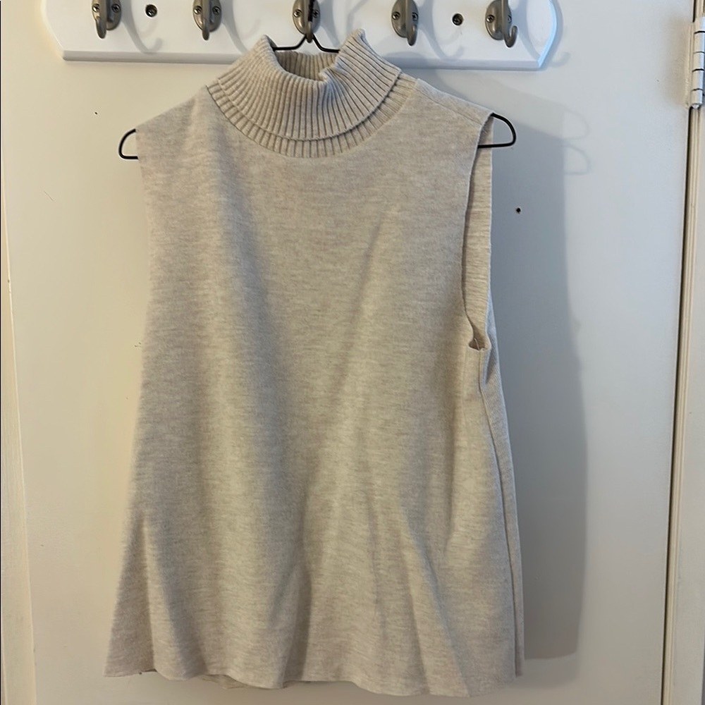 Cozy Beige Sleeveless Turtleneck Sweater